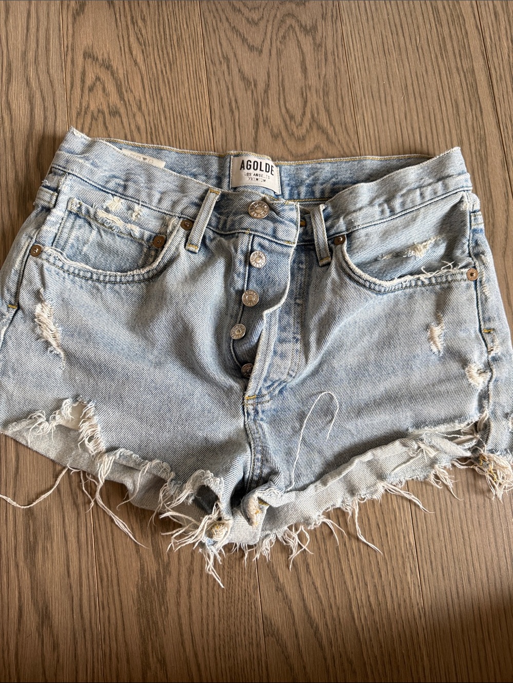 Agolde Light Wash Distressed Denim Cutoff Shorts